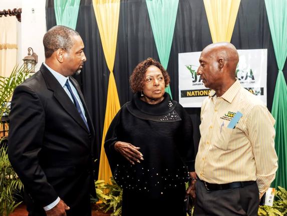 From left: Jamaica Track and Field Coaches Association (JATAFCA) President David Riley, Sports Minister Olivia Grange and  Jamaica Athletics Administrative Association President Garth Gayle at the 2025 JATAFCA Long Service Awards Ceremony at Alhambra Inn i