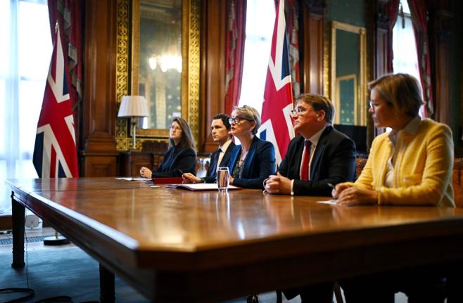 Britain's Foreign Secretary Yvette Cooper, centre, speaks during a virtual summit at the Foreign & Commonwealth Office in London, on Thursday April 2, 2026, with around 35 countries to discuss ways of reopening the Strait of Hormuz. (Leon Neal/Pool Photo v